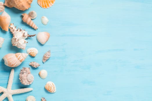 Blue sea background with copy space and seashell border, summer holiday and vacation concept.