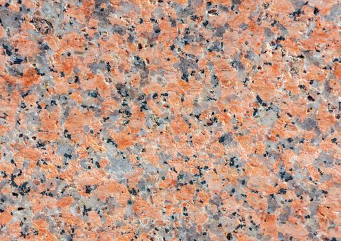 texture of the surface of natural stone - coral gray granite. Stone pattern, background - photo, image.