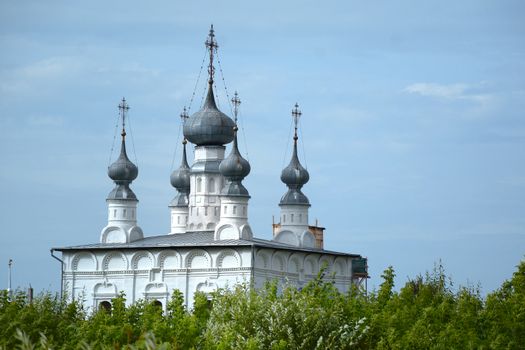 Domes of a religious building with Crosses on the dome on church Cathedral against the sky 