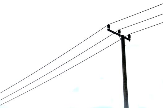 electricity poles against the sky