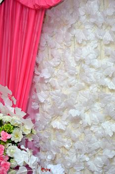 white flower decoration on the wall