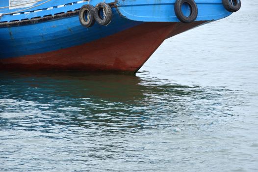 wooden ship at seaport