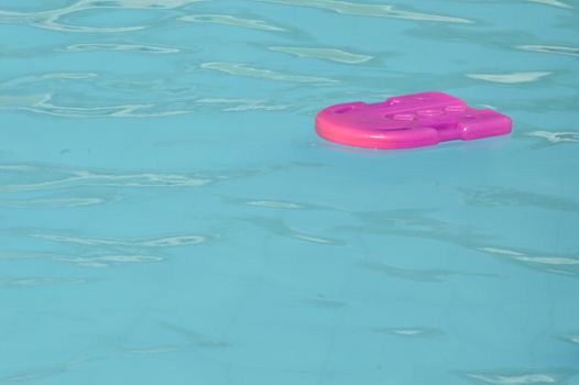 plastic swimming board on the poll