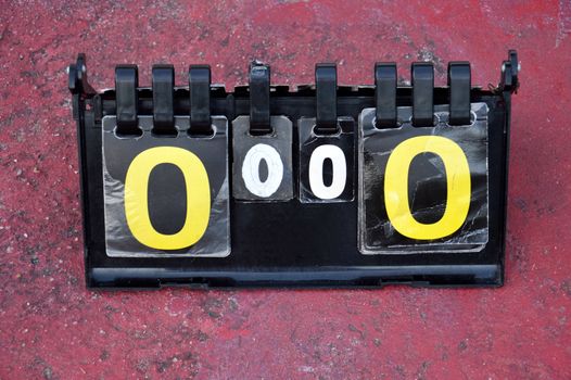 volleyball scoreboard on the cement floor