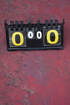 volleyball scoreboard on the cement floor