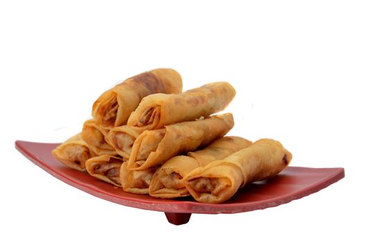 lumpia Semarang or Spring Rolls containing bamboo shoots and chicken on red plate at white background 