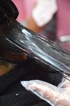 Coloring hair in beauty salon