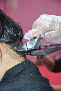 Coloring hair in beauty salon