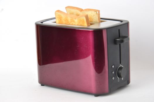 toast  on toaster machine with white background