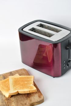 toast with toaster machine on white background 