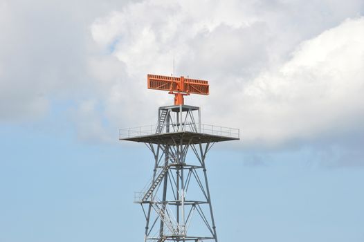 red radar against blue sky