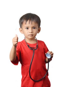 asian little boy dressed in red shirts holding a stethoscope with white background