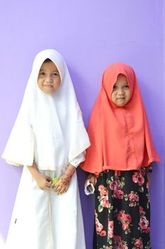 two Asian little girl Muslim