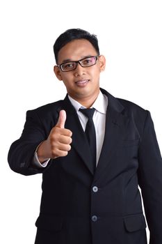 Asian male businessman in a suit make thumb on white background