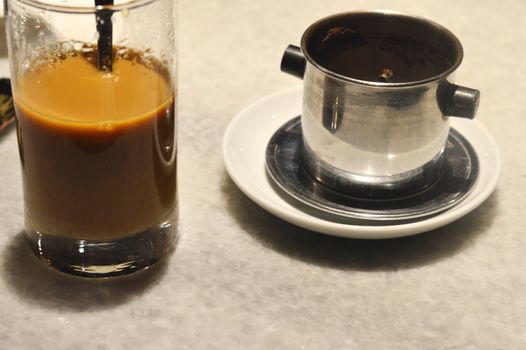 Coffee dripping in vietnamese style at a cafe