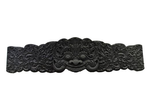black wooden balinese carving isolated on white background