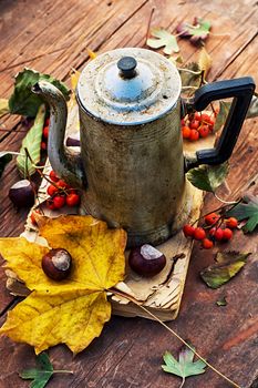 Symbols of autumn, fallen leaves, November, tea