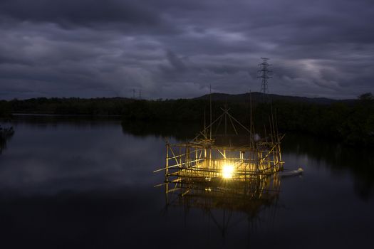 Bagang Fisherman,  a structure build from bamboo for to catch fish at Karajae estuary Pare-pare Indonesia