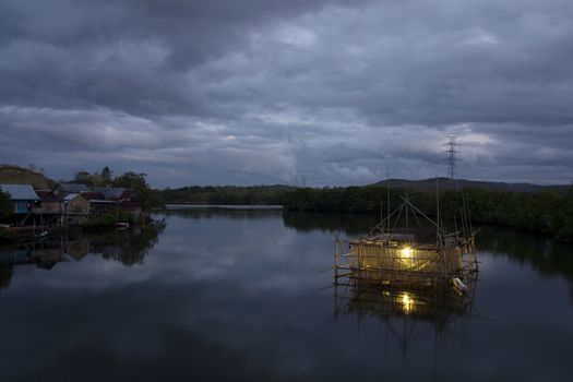 Bagang Fisherman,  a structure build from bamboo for to catch fish at Karajae estuary Pare-pare Indonesia