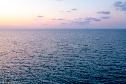 Colorful sunrise on the sea. View of the sea sunrise from the cruise ship.