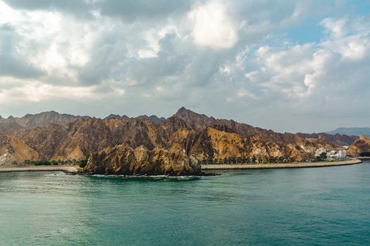 Sea and rocky shores in the fjords of the Gulf of Oman.