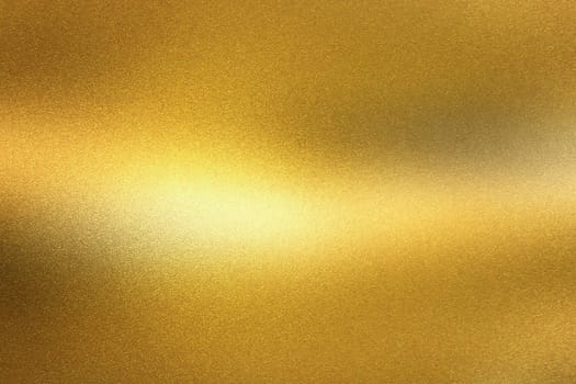 Shiny golden foil wave metal wall, abstract texture background
