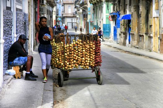 Havana, Cuba - January 11, 2019: Selling onions on the street in Old Havana, Cuba