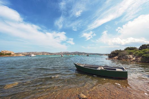 fishing boat on a wild beach in Sardinia, Italy