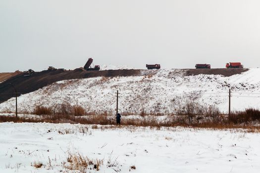 equipment works in the process of waste disposal and landfill reclamation.