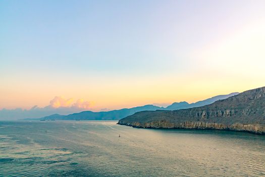 Sea and rocky shores in the fjords of the Gulf of Oman.