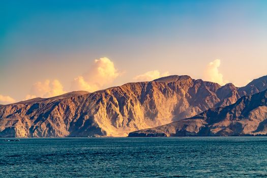 Sea and rocky shores in the fjords of the Gulf of Oman.