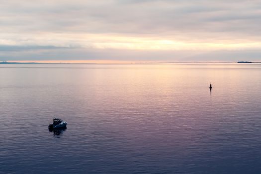 Patrol boat in the Finnish Gulf at sunset.