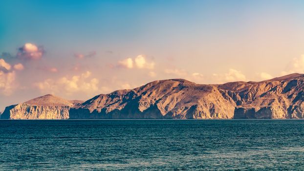 Sea and rocky shores in the fjords of the Gulf of Oman.