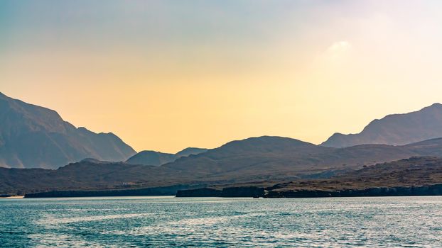 Sea and rocky shores in the fjords of the Gulf of Oman.