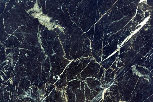 Texture of dark cracked marble, grunge background for design.