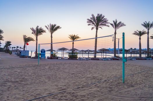 Beach volleyball field on a red sea beach at sunrise in hurghada city