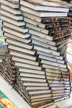 Stack of books stored as  Education and  business concept