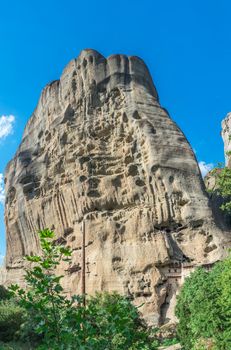 Monastic cave hermit monks houses and rock formation in Meteora near Trikala, Greece.