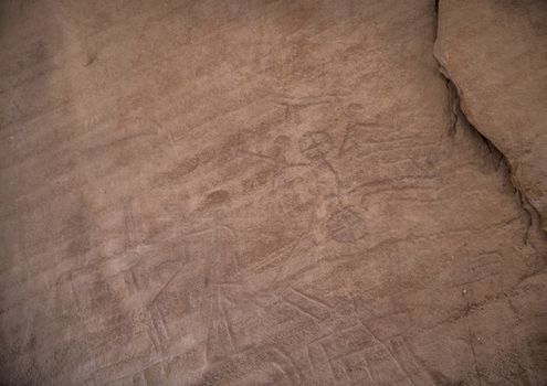 On the face of the external rock, dozens of rock drawings can be seen. Most of the drawings are of animals Ibex and ostrich deer and of hunters. On the rocks around are mining holes and tunnels.