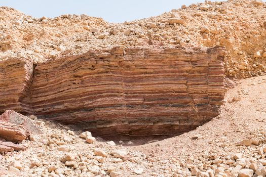 all layers of time seen in the round of the red canyon in israel