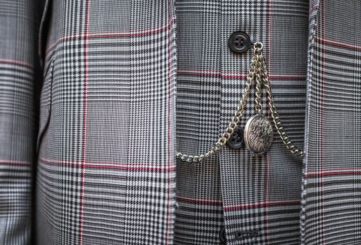 Detail Of A Watch On A Chain On A Smart Men's Waistcoat And Suit