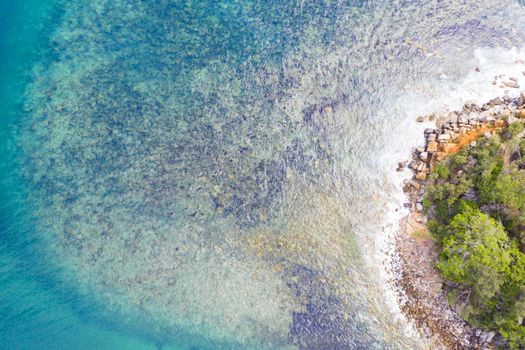 Aqua blue waters and amazing patterns and textures from above around this beautiful rocky cove that is a marine haven as fishing is prohibited here.