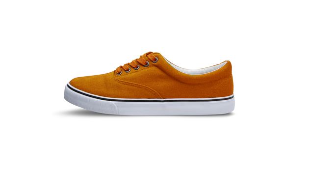 Orange canvas shoes isolated on white background with clipping path