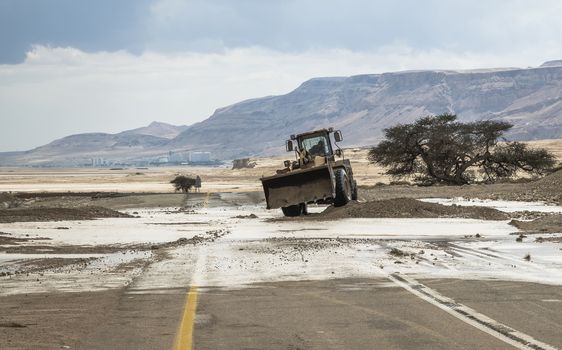 the main road 90 in Israel near Masada is blocked by floods and mud, the road goes from Eilat to jerusalem