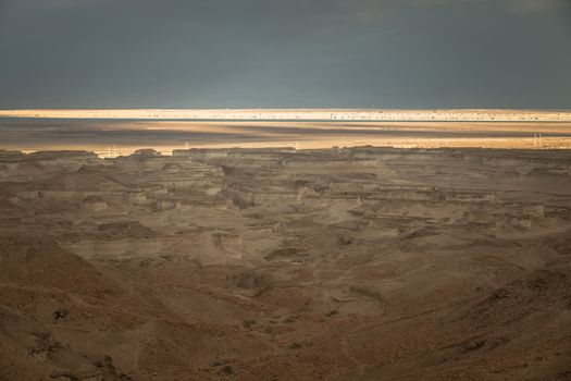 dark clouds over the dead in israel near masada