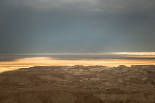 dark clouds over the dead in israel near masada