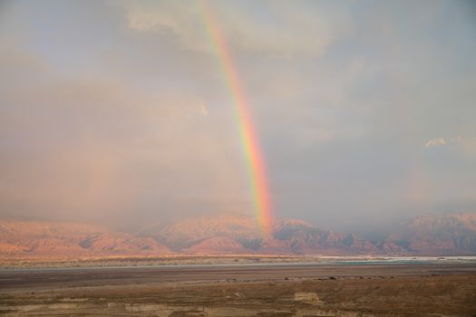 rainbow over the dead sea with jordan as background, view from masada