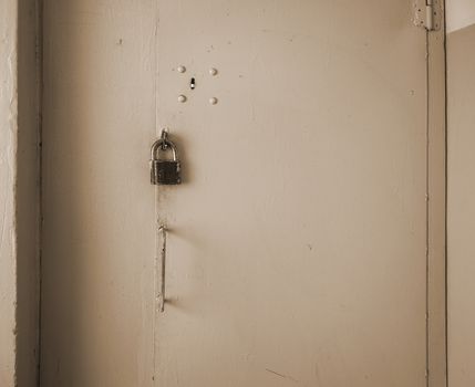 Secure and brightly painted garage door with lock