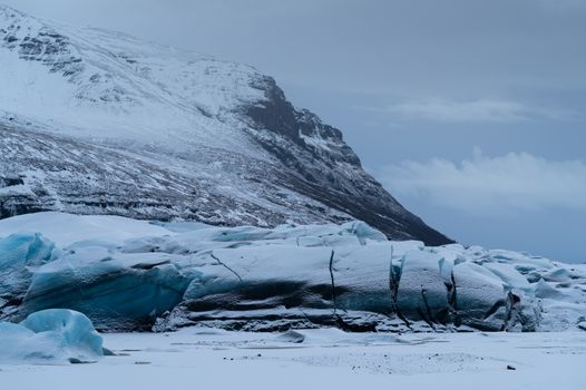 Panoramic image of the snow-coverd glacier Svinafellsjoekull on a winter day after snowfall, Iceland, Europe