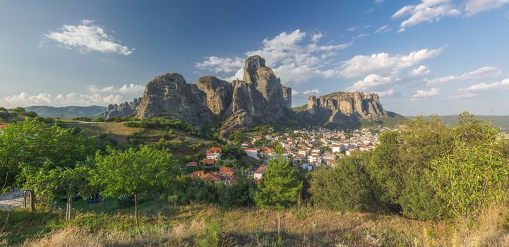 Panoramic view of the Kalambaka town at the foot of the Meteora Mountains in Greece on a sunny summer day